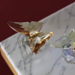 papillon-poirte-bonheur-ambre